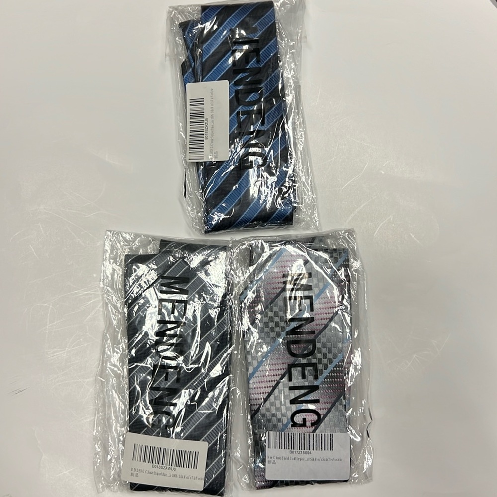 NWT Tie Bundle, in original sealed packaging. Brand new stylish power-ties.